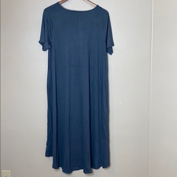 Viscose plus short sleeve round neck pocket dress. - Picture 5 of 6